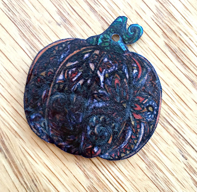 ShrinkyDink pumpkin after baking.