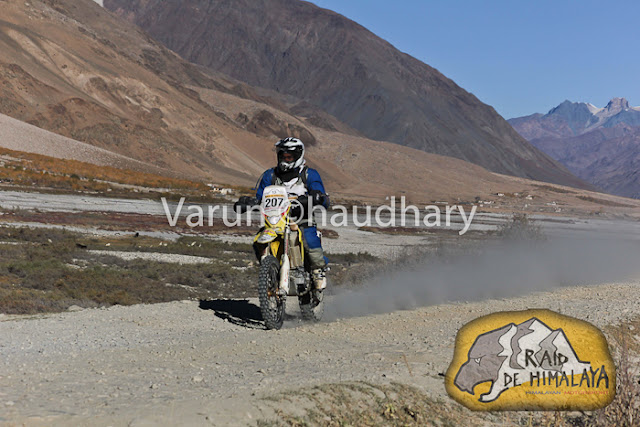 After extreme action of cars at Raid de Himalaya, it's time to have a PHOTO JOURNEY of Bikers. Usually bikes are more interesting to click as compared to cars, but in Raid everything is super exciting !!! Let's start this journey with bikes in action....This whole event is very well planned and everyone is well aware of actions to be happen during the week of Raid. I was really amazed to see the detailing of event at http://www.raid-de-himalaya.com/2011/Xtreme/supregs2w2011.pdf . I have seen documents of other motorsports in North India and most of them are really disorganized and planned very unprofessionally. The whole team of Himalayan Motorsports work really hard to make each thing very special and safe !!!Bikes are really specially for shooting and panning is one of the technique, which can't be missed during such events where bikers love to fly in air...Raid de Himalaya started from Peterhoff Hotel, Shimla and day one ended at Manali through Jalori Pass !!! Whole route was like  Shimla to Manali == Manali-Leh(via Sarchu) ==Leh-Leh(via Wari La & Khardung La) == Leh-Rangdum(via Kargil) == Rangdum-Rangdum(via Padum) == Rangdum-Srinagar(via Kargil)Himalayan Motorsports organize this wonderful event and here are some contact details -Himalayan MotorsportMotoworld, Navbahar, Shimla,Himachal Pradesh - IndiaPhone: +91 (0) 177 2842916Fax: +91 (0) 177 2844338Email: info@raid-de-himalaya.comTotal distance covered was 2200 kilometers, including 667 kilometers of competitive sections. 667 Kms were covered during 11 different competitive stages. The Moto Alpine was about running the first 3 legs of the rally and end at night haltof leg 3 at Leh. This shorter version was open to all newcomers to the Raid de HimalayaOnly those that had never participated before in the Raid (on a / Quad) are eligible tenter for the Moto Alpine.The Moto Xtreme was complete version of the Raid de Himalaya, running all 6 legs anwas open to both previous participants as well as the new entrants to the Raid, In shorwhereas a previous participant could not enter the Moto Alpine...Bikes of 100cc to 700cc participate in Raid and all of them are categorized into different classes, on the basis of their machine powers.Most of these folks used some imported bikes or modified versions of high power bikes. On top of that each biker needs to have a team to ensure that any break-down on the way can be fixed as quick as possible.Another special thing about these motorsport rallies is their route. Most difficult terrain are chosen with appropriate safely measures in mind. In fact, security planning takes various months to finalize things with Government and private agencies. All riders in Raid are really disciplined about safely as well. Following passion with proper safely measures is also very important.Raid de Himalaya rally passes through various villages in Himachal Pradesh and Jammu & Kashmir !!!Riding on such a road is a real luxury. At various points it's difficult to find the road on rough hills with landslides and water streams around !!! Riding bike in Raid is really difficult as riders have no option of driving the vehicles by sitting on closed cabins. Weather is another challenge for bike riders in Raid de HimalayaSome information picked from official Facebook page of RAID DE HIMALAYA Raid de Himalaya is among the most extreme motor sport events organized at an international level. It runs on the highest altitudes as compared to others including the Paris Dakar Rally. http://www.raid-de-himalaya.com/Mountains and Bikes seem to be made to be seen together. Several Indian travellers have now started taking on the mountains on their bikes. The main reason is the same as the the bikers participating in the rally - the thrill of scaling these heights.Navigating the curves, dodging the rocks, and leaving a dust trail, the riders manoever their mean machines faultlessly and spectators can't do much but stare at them with awe.They look the same at a glance, but all riders have their own unique techniques that only experts can detect.Amongst the barren, brown hills the only streaks of colour are these motorbikes. For the duration of the rally, the region comes alive with these dashing, roaring machines.In spite of the tiring route that not only makes you push the boundaries of your schools, each biker starts longing to return for another ride, another adventure soon after one is over.Rearing and roaring like a wild beast, these bikes are merely pets in their riders' hands, obeying each command, following each direction to the last letter.Once the race is over and the bikers have left, the hills lie forlorn, full of longing for these noisy destructive forces of technology to come and make them come alive again.The heights seem scalable and the terrain no longer a foe, when you are flying on your machine. No wonder each biker comes back year after year to scale these heights till they become as familiar to them as the back of their hands. 