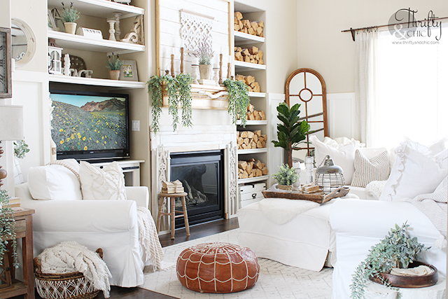 farmhouse style spring living room decor. Spring living room decorating ideas. White and woods living room decor. spring decorating ideas for the home. Two story living room decor. Ikea ektorp couches. Spring mantle decorating ideas. Neutral living room decor