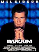 Mel Gibson in Ransom - head and shoulders photo against blue tv screens background