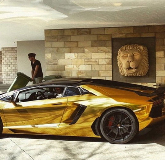 Guy With Gold Ferrari