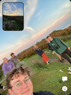 A selfie of a group of young people birding at the Farm.