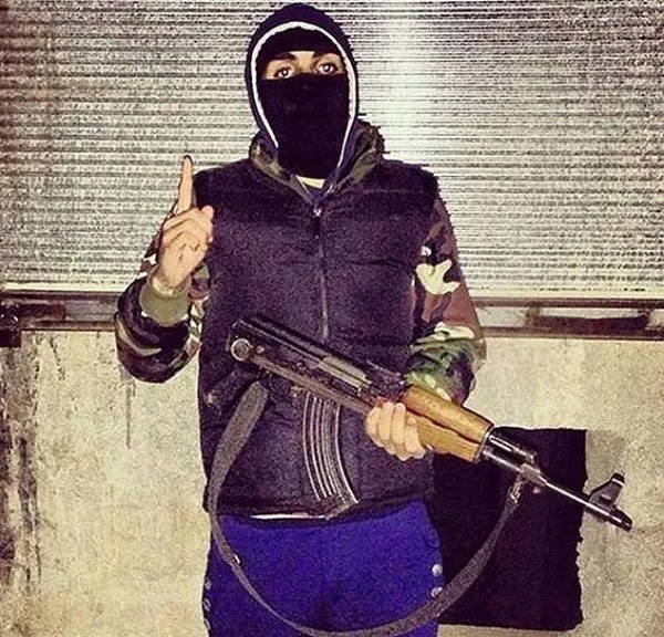 Abdel-Majed Abdel Bary holding a gun