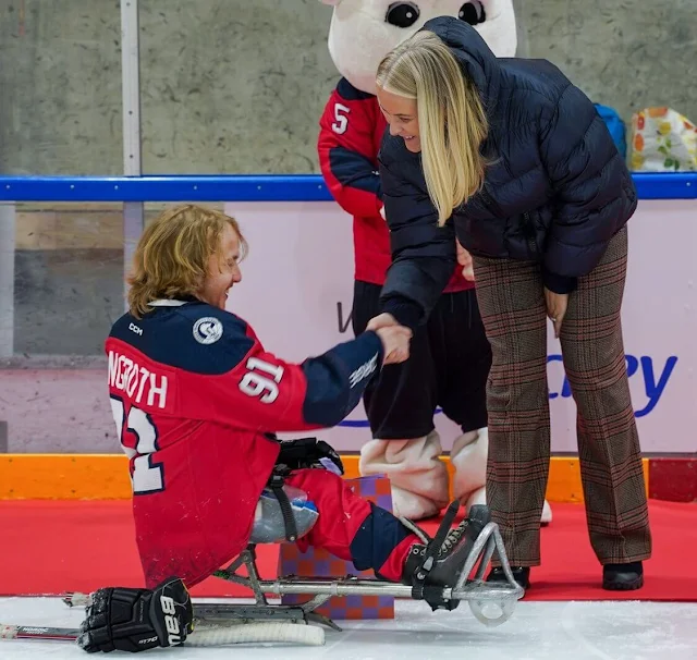 Crown Princess Mette-Marit wore fouquet trousers by Pallas Paris. Norway and Great Britain World Para Ice Hockey match