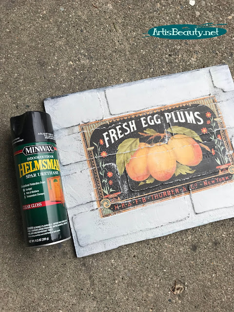 SPRAYING VINTAGE TRANSFER ART TO PROTECT ON BRICK PANELING