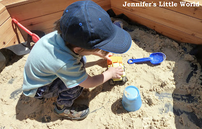 Child playing in sandpit