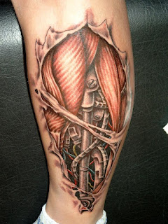 bio-mechanical tattoo on the calf