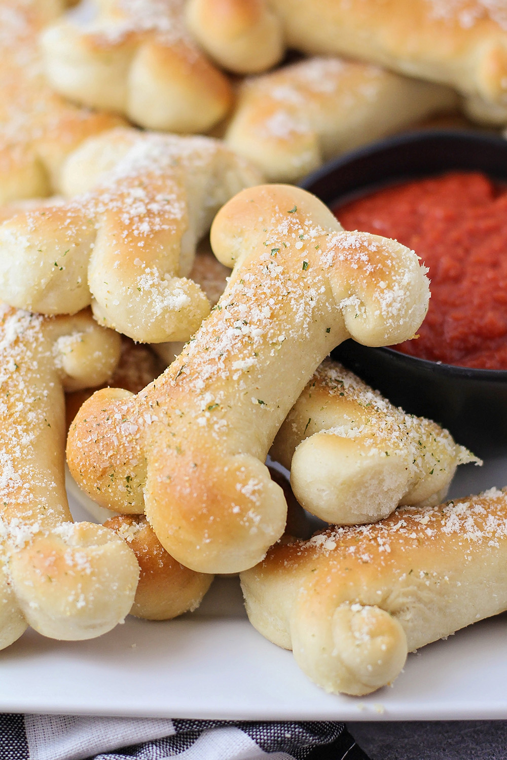 These breadstick bones are so cute and so easy to make! They’re the perfect side dish for your Halloween feast!