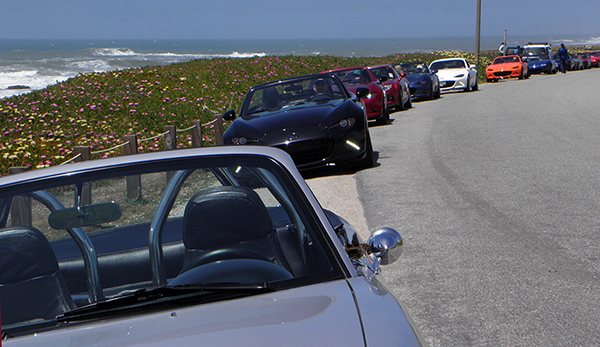 Parked Miata Lineup with Pacific Ocean