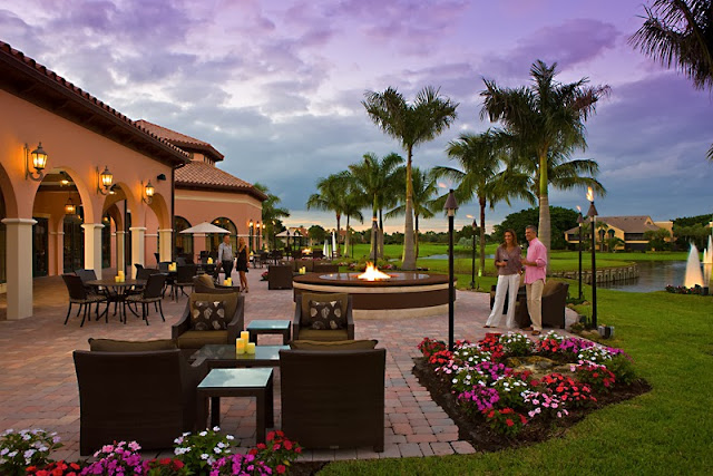 Early evening view of the Main Clubhouse patio overlooking the 18th hole greens