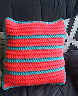 http://www.ravelry.com/patterns/library/colorful-striped-pillow