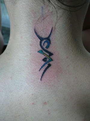 Small Tribal Neck Tattoo