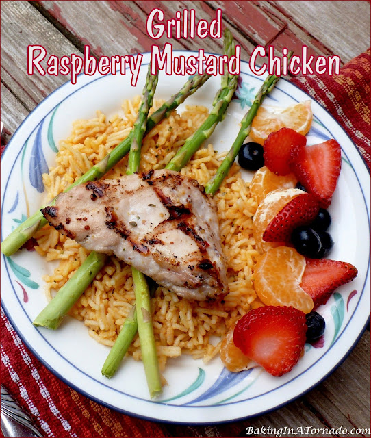 Grilled Raspberry Mustard Chicken is a quick, easy dinner, marinate, grill, serve. | recipe developed by www.BakingInATornado.com | #recipe #dinner