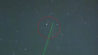 Green laser pointer used to get UFOs attention possible first contact with Aliens.