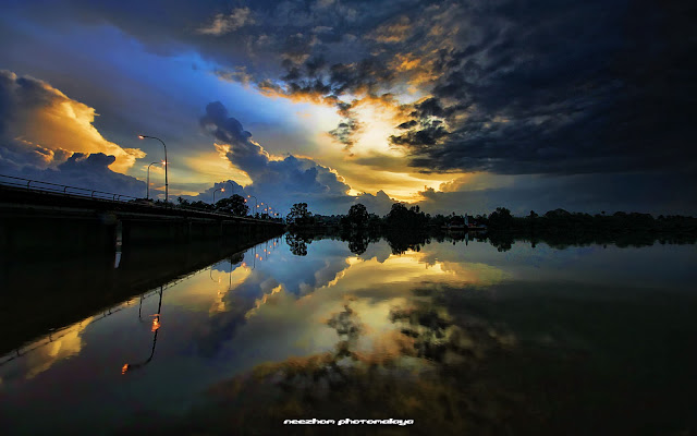 Batik sunrise and reflection at Manir river