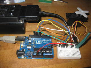 Arduino connected to servo and foot pedal radio dongle