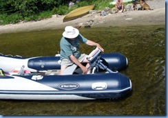 7222 Restoule Provincial Park - Bill attaching motor to transom