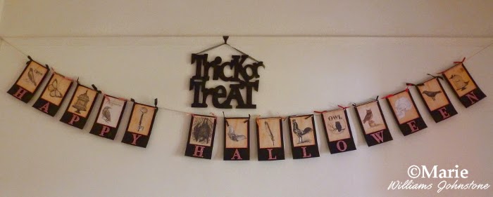 Trick or treat wall decoration in black with handmade garland bunting underneath