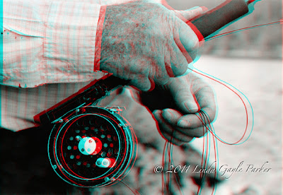 3D, dad, hands, fly fishing pole, fishing line, river, beach, rocks, Stillaguamish, closeup