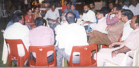  Participants in discussion during dinner 