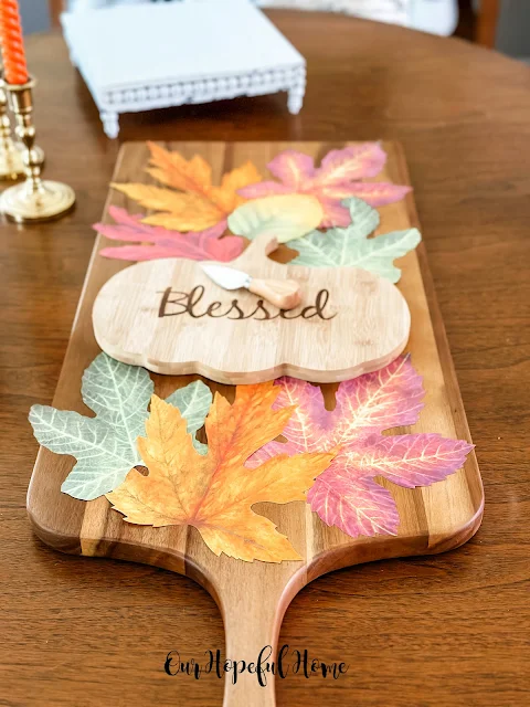 French paper fall colored leaves charcuterie board display
