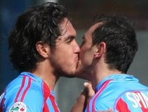 Catania players celebrate a goal