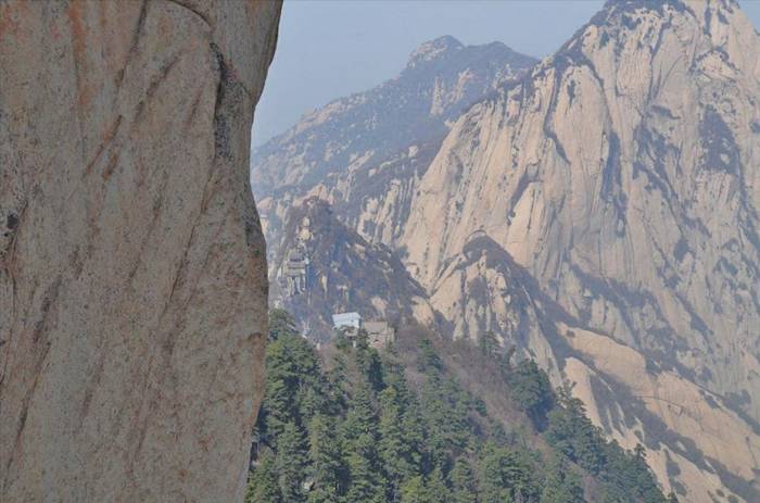 Mount Hua Shan is located near the southeast corner of the Ordos Loop section of the Yellow River basin, south of the Wei River valley, at the eastern end of the Qin Mountains, in southern Shaanxi province. It is part of the Qin Ling Mountain Range that divides not only northern and southern Shaanxi, but also China.