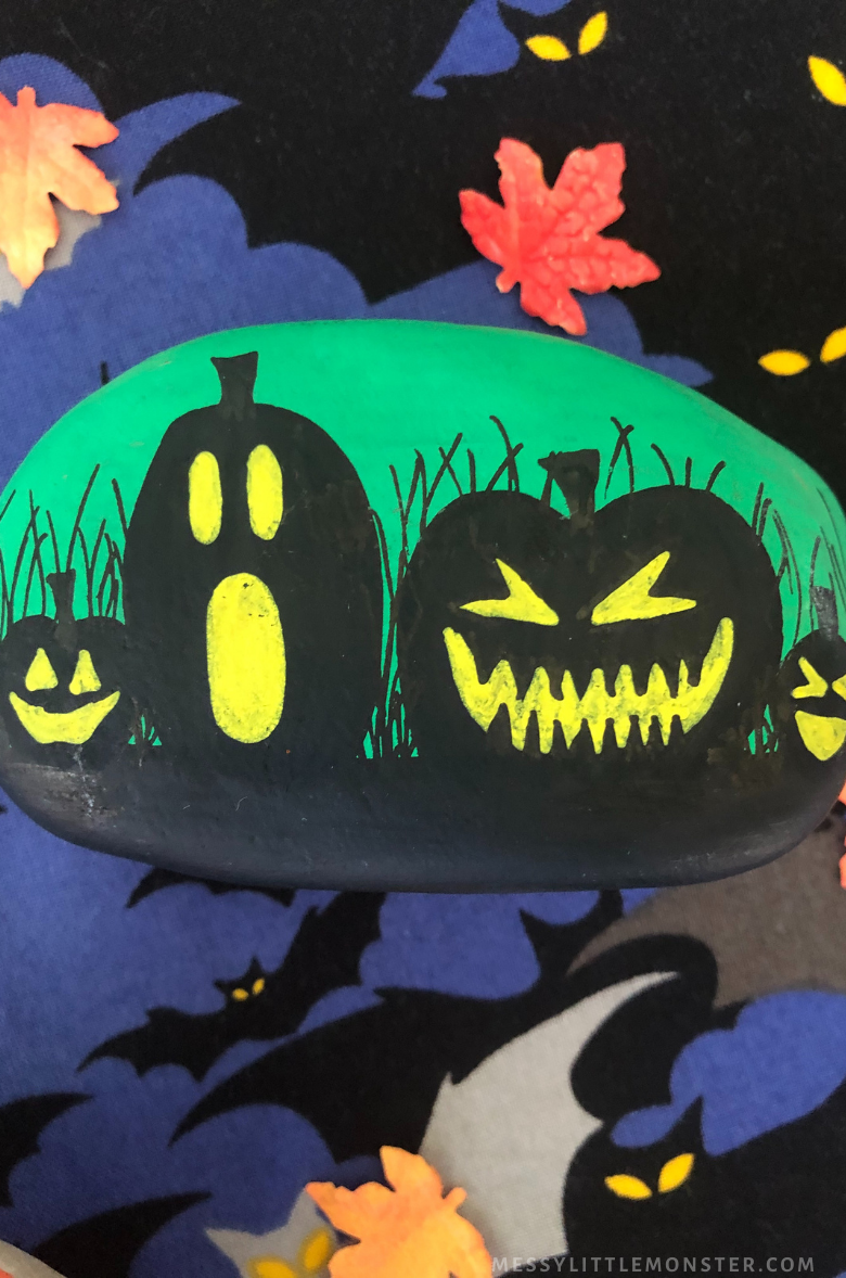 Halloween rock painting - pumpkins and jack o lanterns