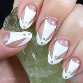 Funky white negative space nail art look inspired by fashion for the Nail Challenge Collaborative.