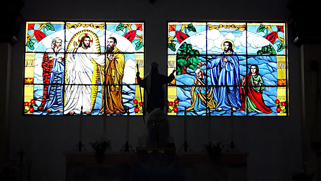 stained glass murals at the altar of St. James the Greater Parish Church in Allen Northern Samar