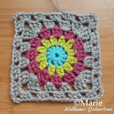 Completed granny square sunburst pattern with full photo and text tutorial to follow