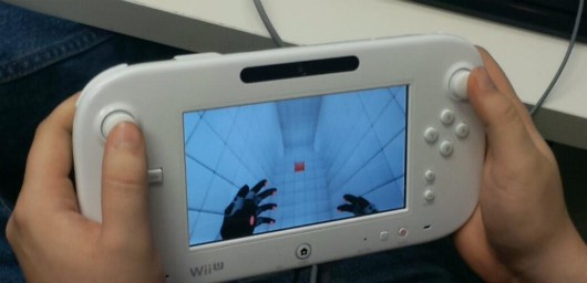 Image video game QUBE being played on Wii U GamePad