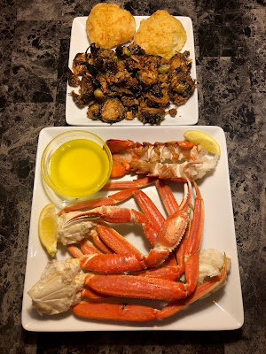 Snow crab legs, lobster tail, crispy Brussels sprout and cheddar biscuits from Red Lobster