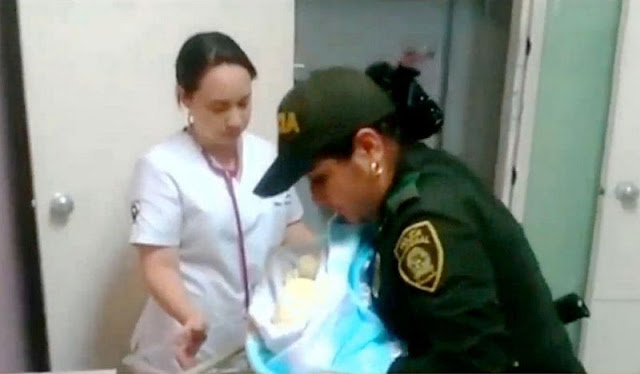 A Colombian officer breastfeeds an abandoned baby!