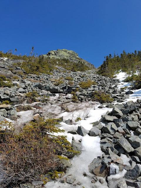 Early Spring ascent of the Mount Flume Talus Slide