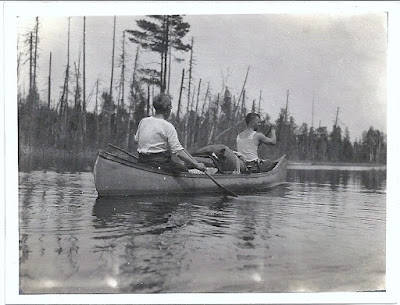 Amos Putnam in a canoe