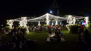 Photograph: pavilion-like-structure with bright silvery lights at Palawan Green, Sentosa