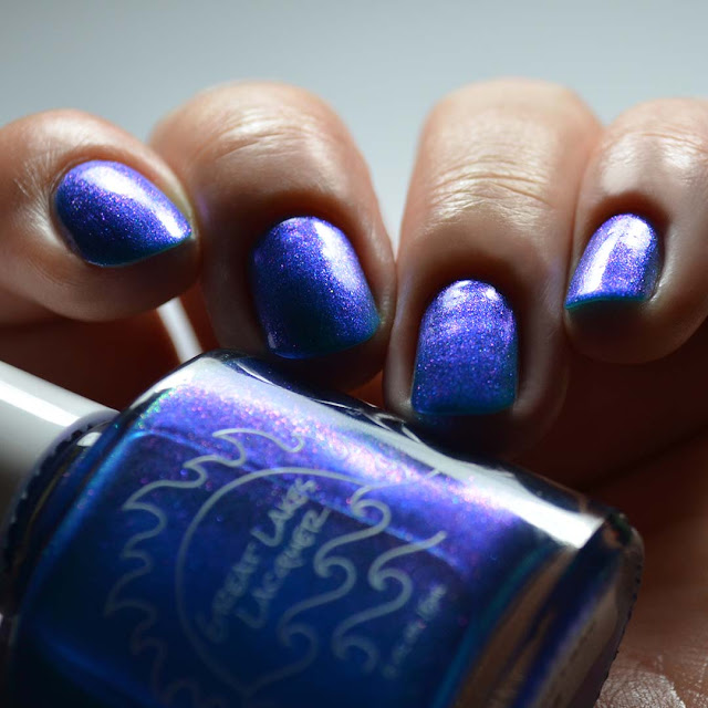 inky blue nail polish with aurora shimmer