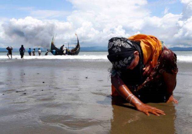 A Rohingya refugee after getting to Bangladesh by boat. This picture won Siddiqui a Pultizer award. (Image via: Reuters)