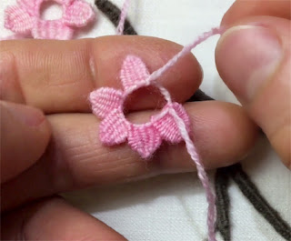 In this tutorial, I'm demonstrating the step-by-step creation of a captivating 3D cherry blossom branch embroidery design using needle weaving stitch and woven picot stitch techniques, while also sharing stumpwork ideas