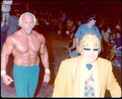 Superstar Billy Graham with the Grand Wizard after a match