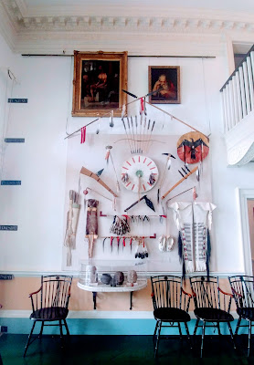 Wall display of Native American artifacts