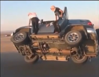 Saudi Arabians Change Tyres On Moving Cars