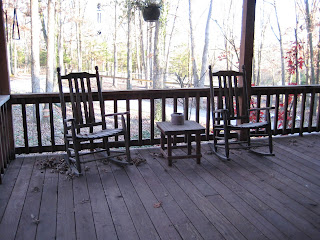 two wooden rocking chairs on my front porch