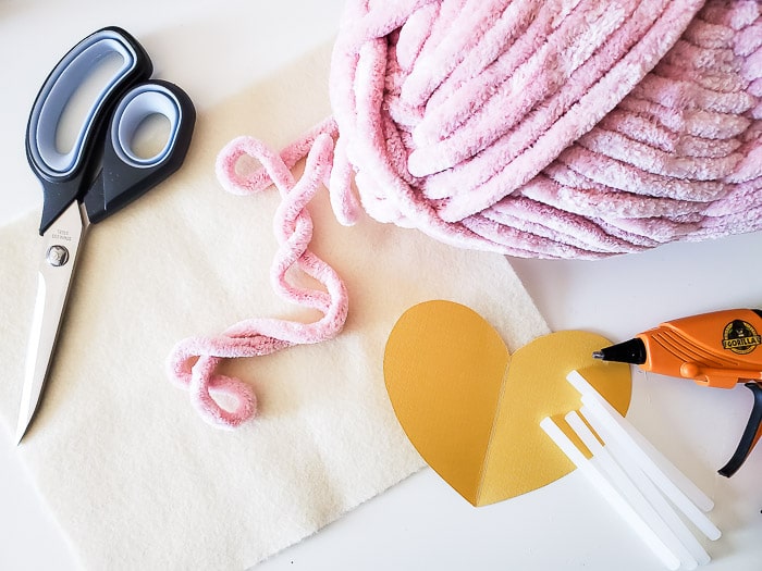 supplies for DIY yarn heart coasters