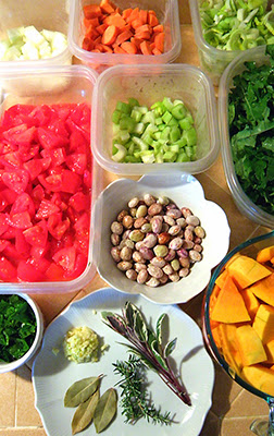 Plates and Bowls of Herbs, Veggies, and Fresh Beans