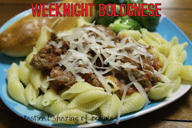 Weeknight Bolognese - a scrumptious red sauce with a hint of nutmeg, served over a heap of pasta #recipe