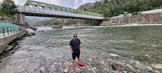 Author Sunil Goel standing by river Sutlej near Rampur Hydro Power Station by SJVN Jhakri Dutt Nagar Bushshahr Himachal