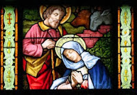 Stained glass image of St. Joseph