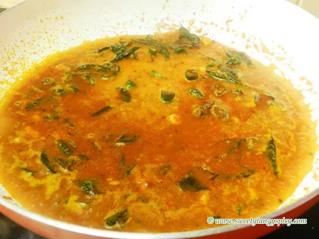 Bringing Spiced Mixture to a Boil with Boiled Water for Naranga Curry